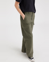View of model wearing Army Green Cargo Pant, High Wide Fit.