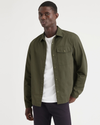Front view of model wearing Army Green Overshirt, Relaxed Fit.