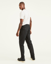 Back view of model wearing Beautiful Black Dockers® x Jon Rose Collection Fatigue Pants, Straight Fit.