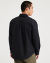Back view of model wearing Beautiful Black Essential Button-Up Shirt, Classic Fit.