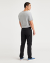 Back view of model wearing Beautiful Black Go Pant, Slim Tapered Fit with Airweave.
