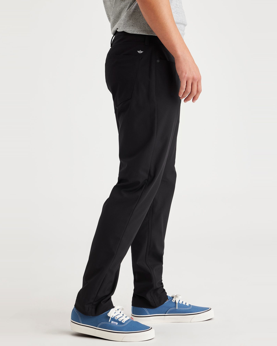 Side view of model wearing Beautiful Black Go Pant, Slim Tapered Fit with Airweave.