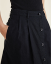 View of model wearing Beautiful Black Midi Skirt.