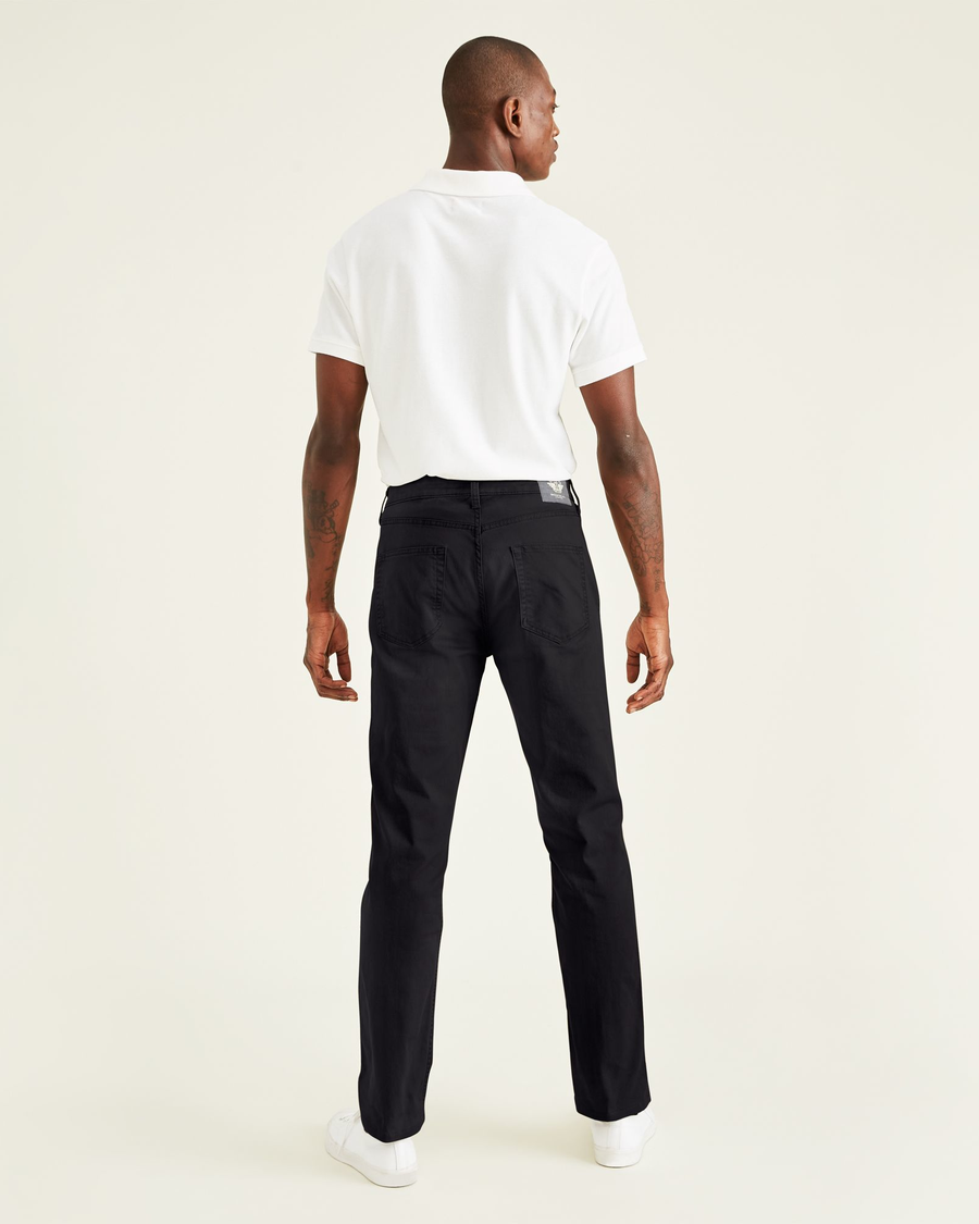 Back view of model wearing Black Jean Cut Pants, Straight Fit.