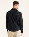 Back view of model wearing Black Signature Comfort Flex Shirt, Classic Fit (Big and Tall).
