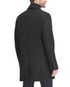 Back view of model wearing Black Wool Blend Top Coat with Bib.