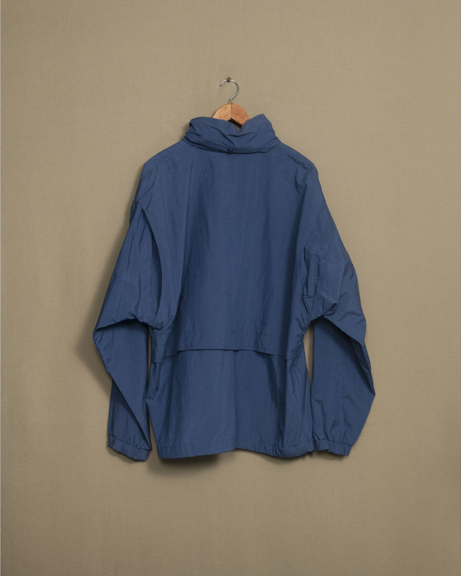 Back view of model wearing Blue Blue Golf Anorak - L.