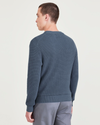 Back view of model wearing Blue Fusion Sweater, Regular Fit.