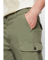 View of model wearing Camo Cargo Pants, Slim Tapered Fit.