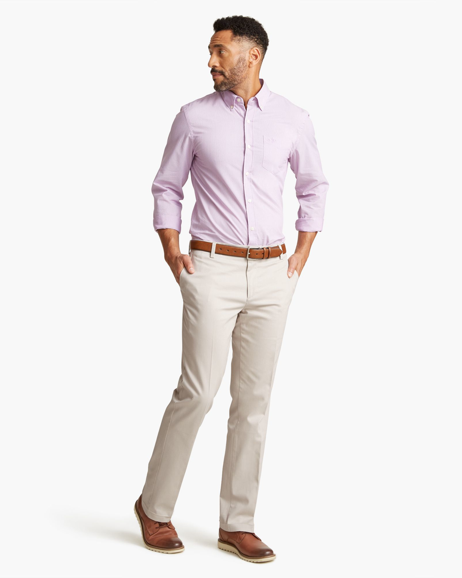 Front view of model wearing Cloud Signature Khakis, Straight Fit.