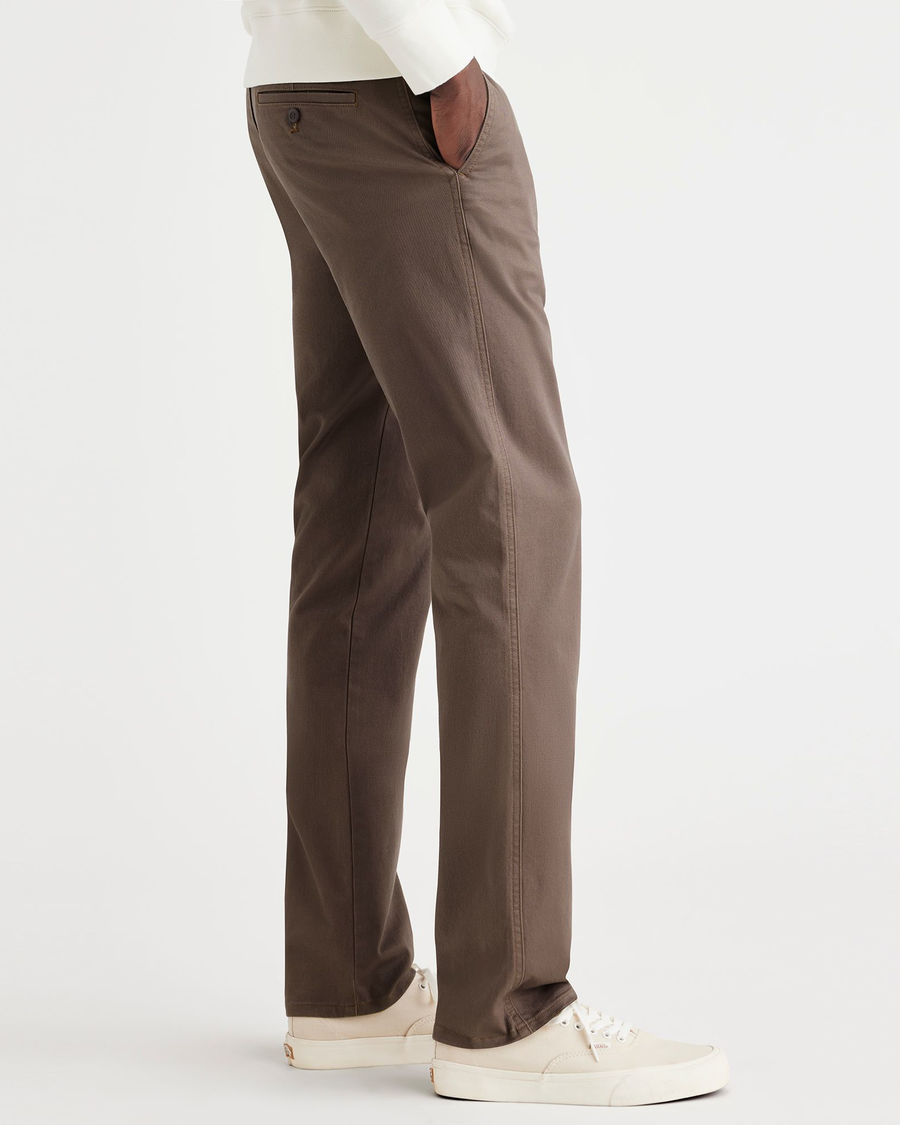 Side view of model wearing Coffee Quartz Original Chinos, Slim Fit.