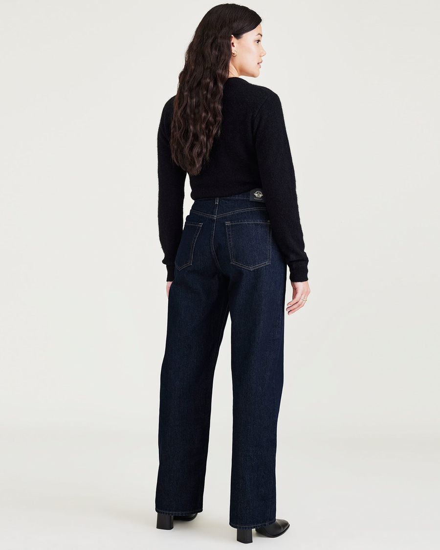 Back view of model wearing Dark Indigo Stonewash Mid-Rise Jeans, Relaxed Fit.