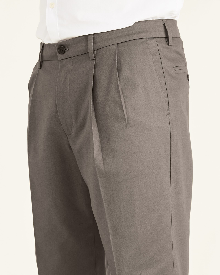 View of model wearing Dark Pebble Signature Khakis, Pleated, Classic Fit (Big and Tall).