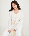 View of model wearing Egret Cropped Cardigan, Relaxed Fit.