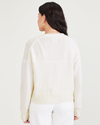 Back view of model wearing Egret Cropped Cardigan, Relaxed Fit.