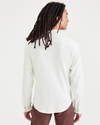 Back view of model wearing Egret Knit Button-Up Shirt, Regular Fit.