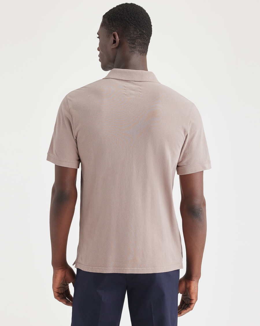 Back view of model wearing Fawn Rib Collar Polo, Slim Fit.