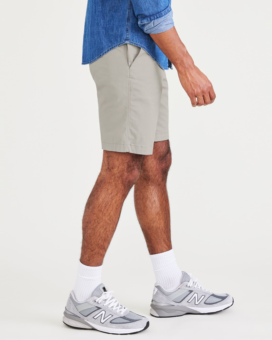 Side view of model wearing Forest Fog Ultimate Short, Straight Fit.