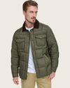 View of model wearing Forest Green Midweight Box Quilted Jacket.