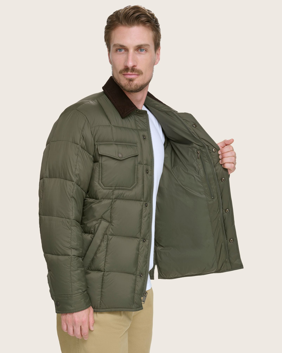 View of model wearing Forest Green Midweight Box Quilted Jacket.