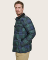 Side view of model wearing Forest Green Plaid Houndstooth Midweight Box Quilted Jacket.