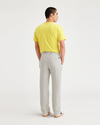 Back view of model wearing Grit Comfort Knit Chinos, Slim Fit.