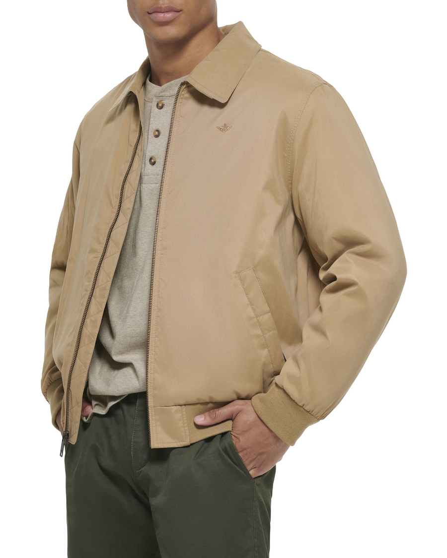Side view of model wearing Harvest Gold Microtwill Relaxed Laydown Collar Bomber.