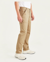 Side view of model wearing Harvest Gold Utility Pants, Straight Fit.