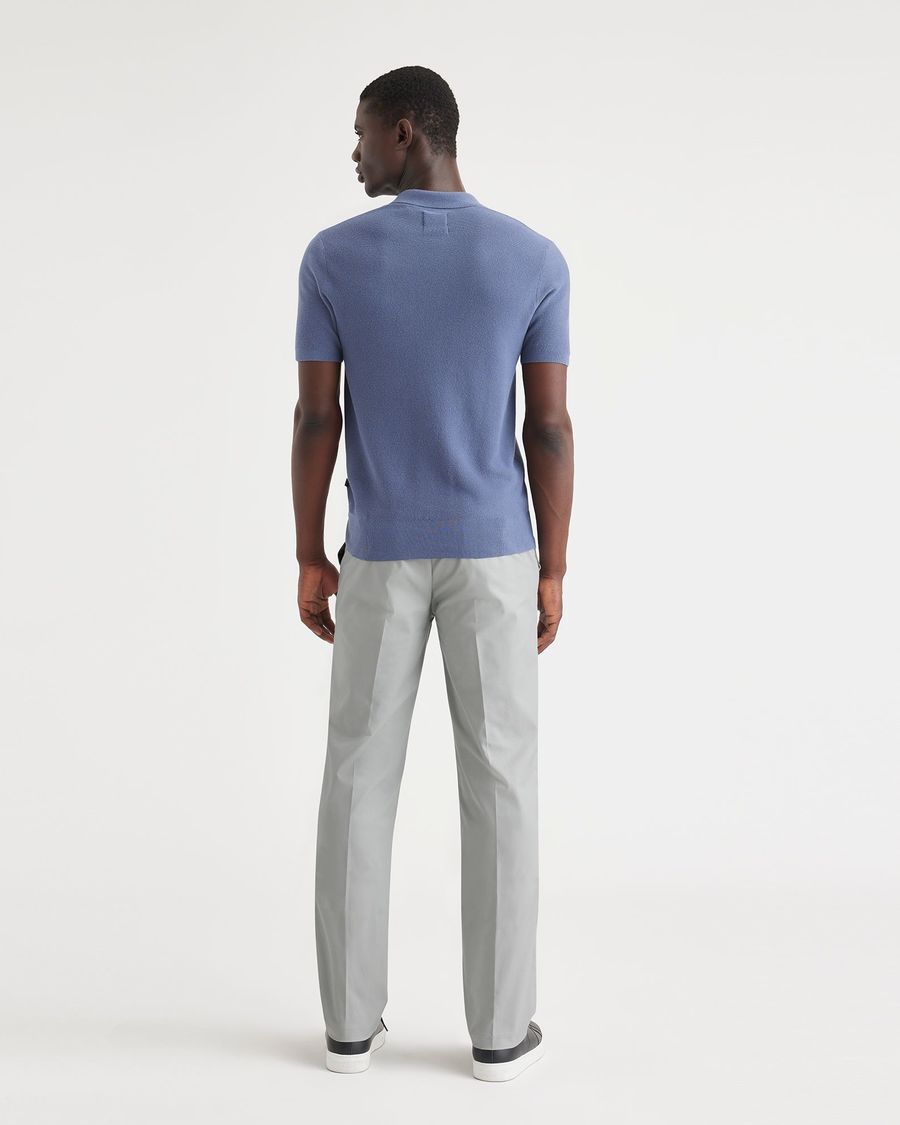 Back view of model wearing High Rise City Tech Trousers, Straight Fit.
