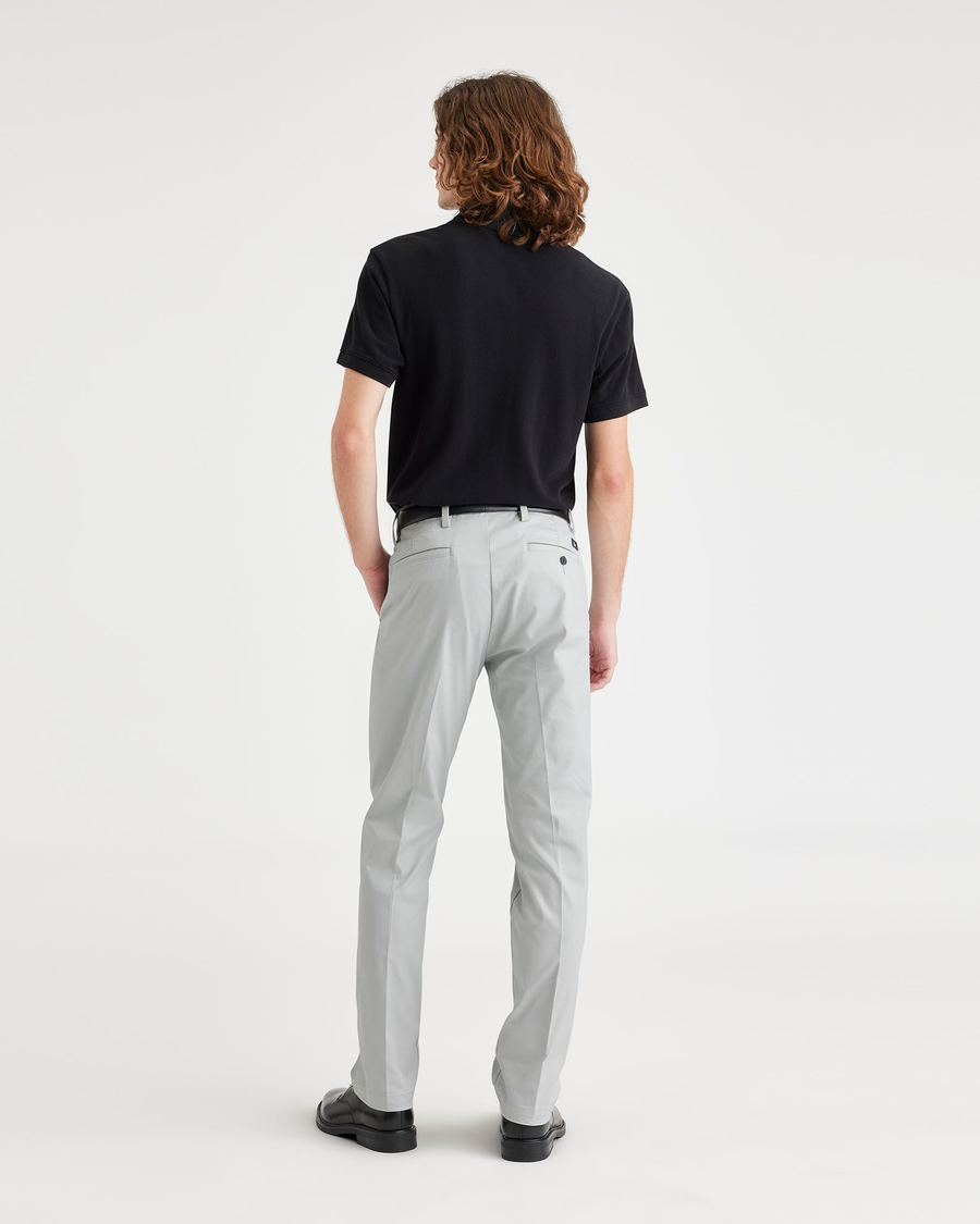 Back view of model wearing High Rise Workday Khakis, Slim Fit.