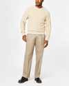 Front view of model wearing Khaki Signature Khakis, Pleated, Relaxed Fit.
