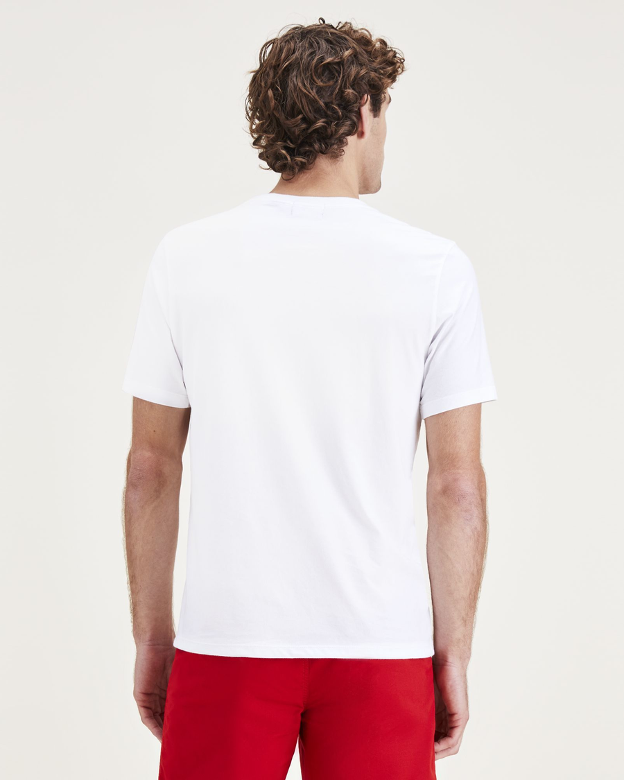Back view of model wearing Lucent White 1986 Groove Graphic Tee, Slim Fit.