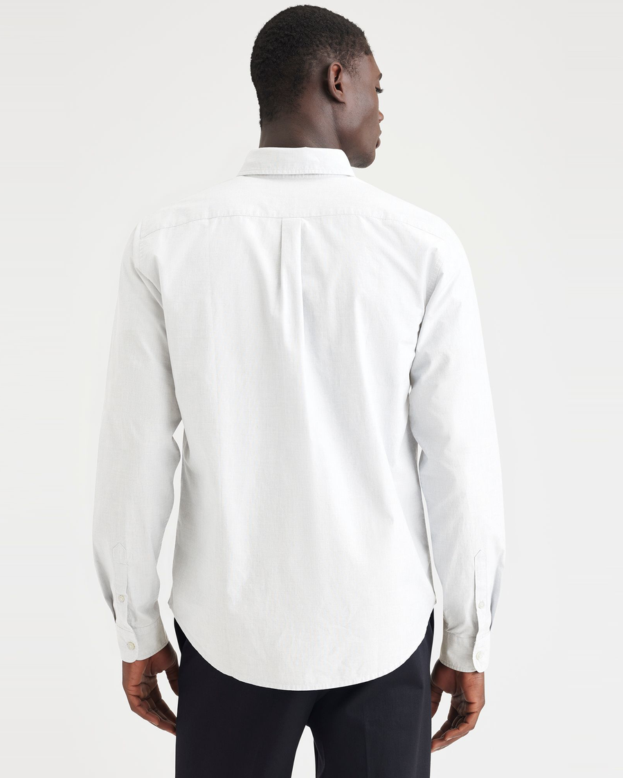 Back view of model wearing Lucent White Essential Button-Up Shirt, Classic Fit.
