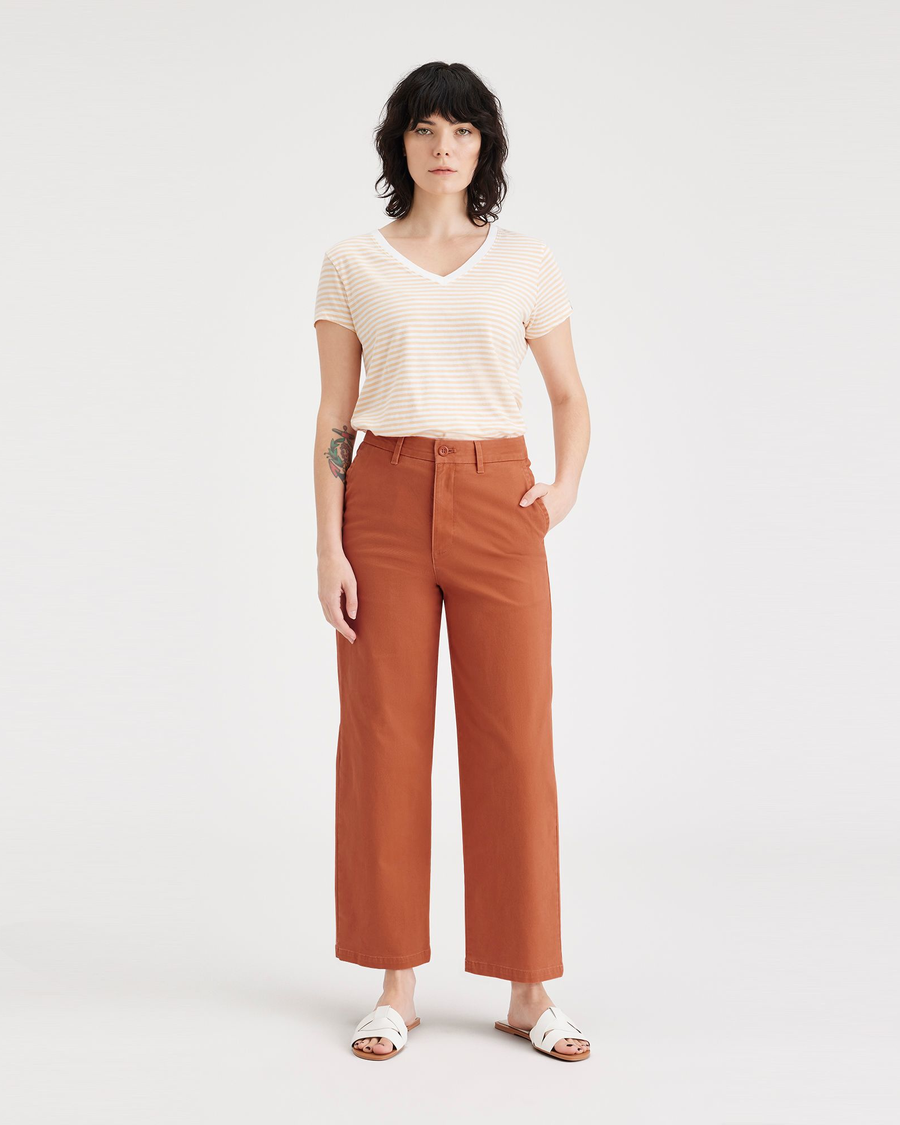 Front view of model wearing Mango Weekend Chinos, Straight Fit.