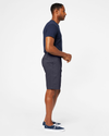 Side view of model wearing Maritime Perfect 10.5" Shorts.