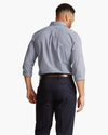 Back view of model wearing Medieval Blue Signature Comfort Flex Shirt, Classic Fit.