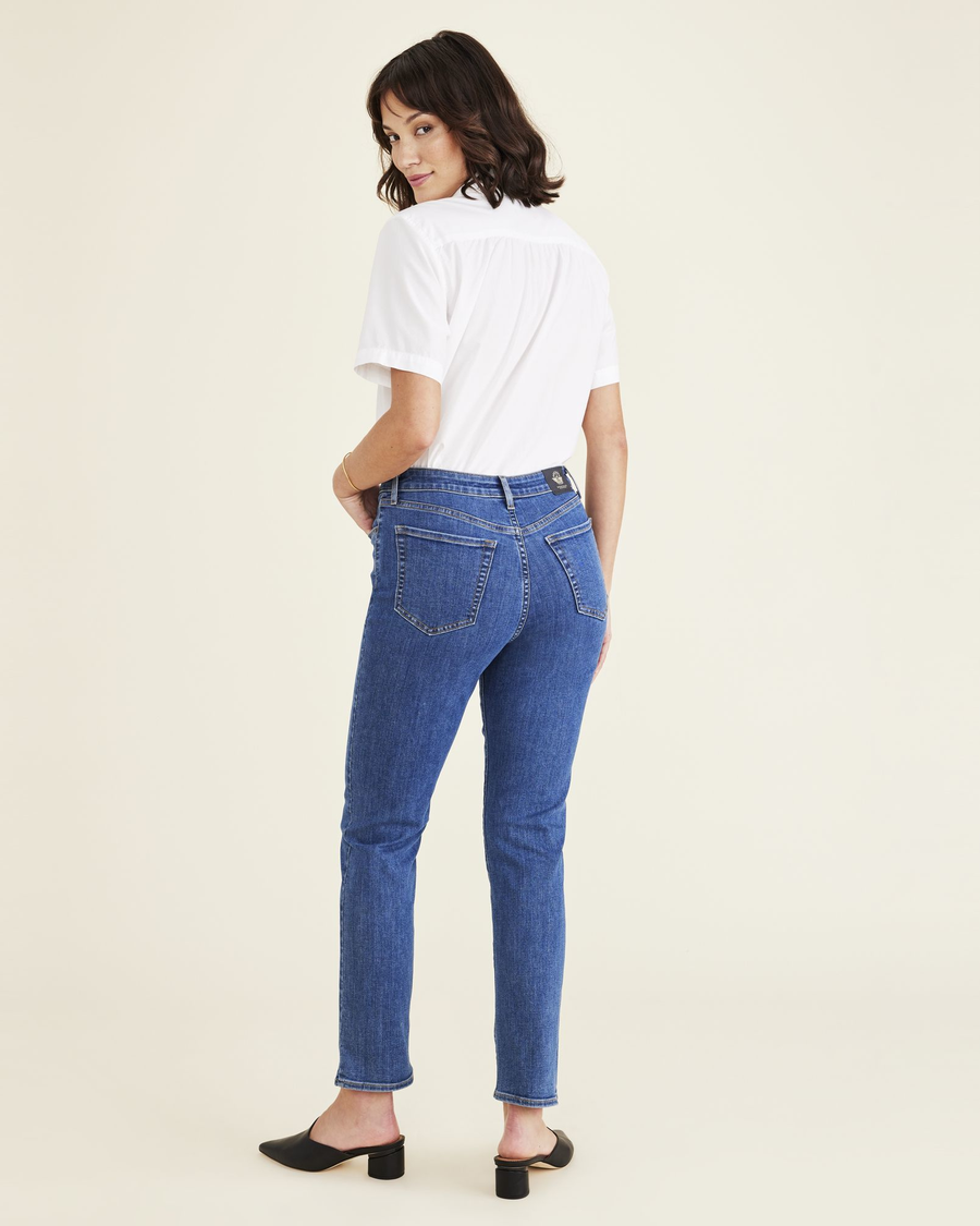 Back view of model wearing Medium Indigo Stonewash Jean Cut Pants, High Slim Fit.