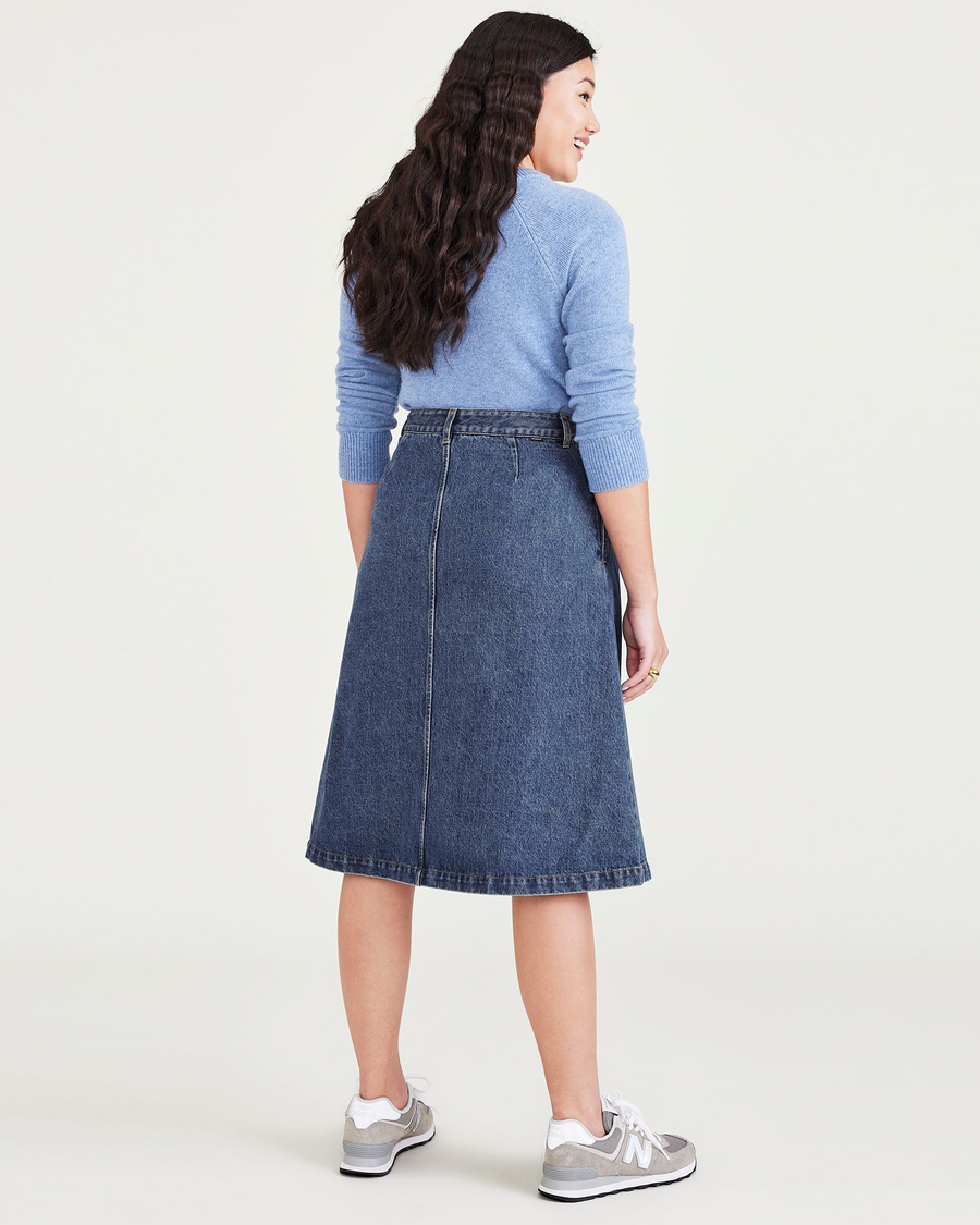 Back view of model wearing Medium Indigo Stonewash Midi Skirt.