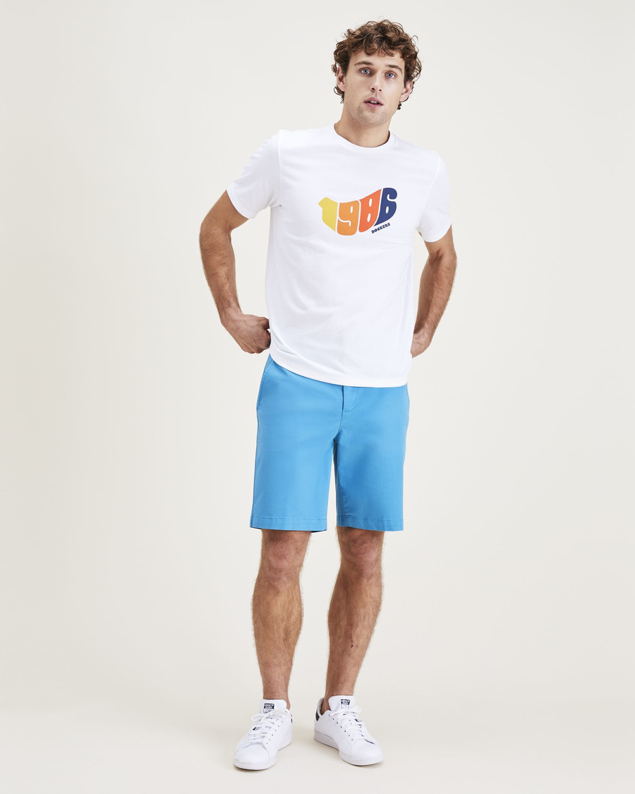 Front view of model wearing Navagio Bay Ultimate 9.5" Shorts.