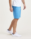 Side view of model wearing Navagio Bay Ultimate 9.5" Shorts.