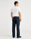Back view of model wearing Navy Blazer Essential Chinos, Pleated, Classic Fit.