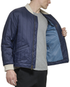 View of model wearing Navy Blazer Recycled Nylon Channel Quilted Bomber Jacket.