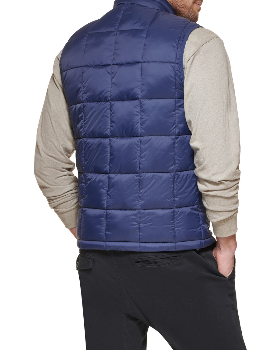 View of model wearing Navy Box Quilt Puffer Vest, Regular Fit.