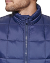 View of model wearing Navy Box Quilt Puffer Vest, Regular Fit.