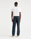 Back view of model wearing Navy Crisp Original Chinos, Relaxed Tapered Fit.