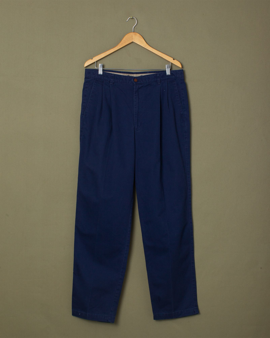 Front view of model wearing Navy Double Pleated Pants, Relaxed Fit - 36x32.