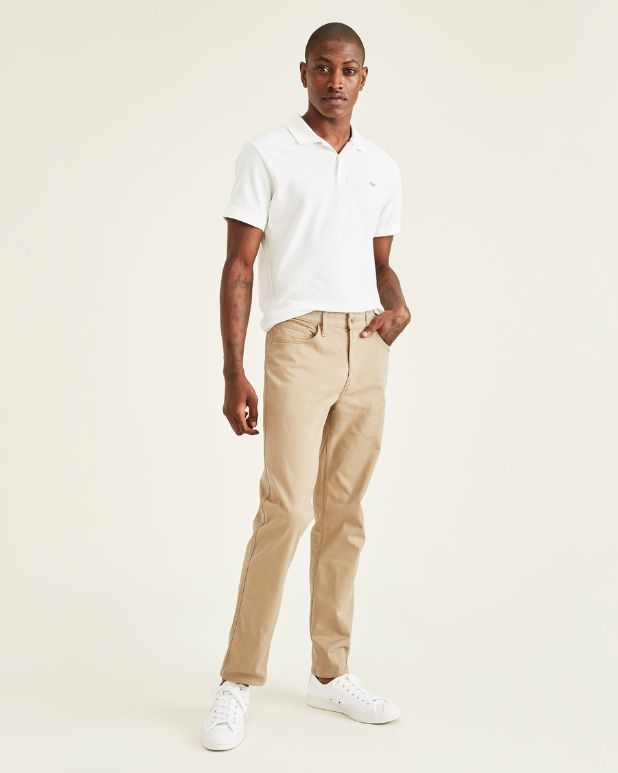 Front view of model wearing New British Khaki Jean Cut Pants, Straight Fit.