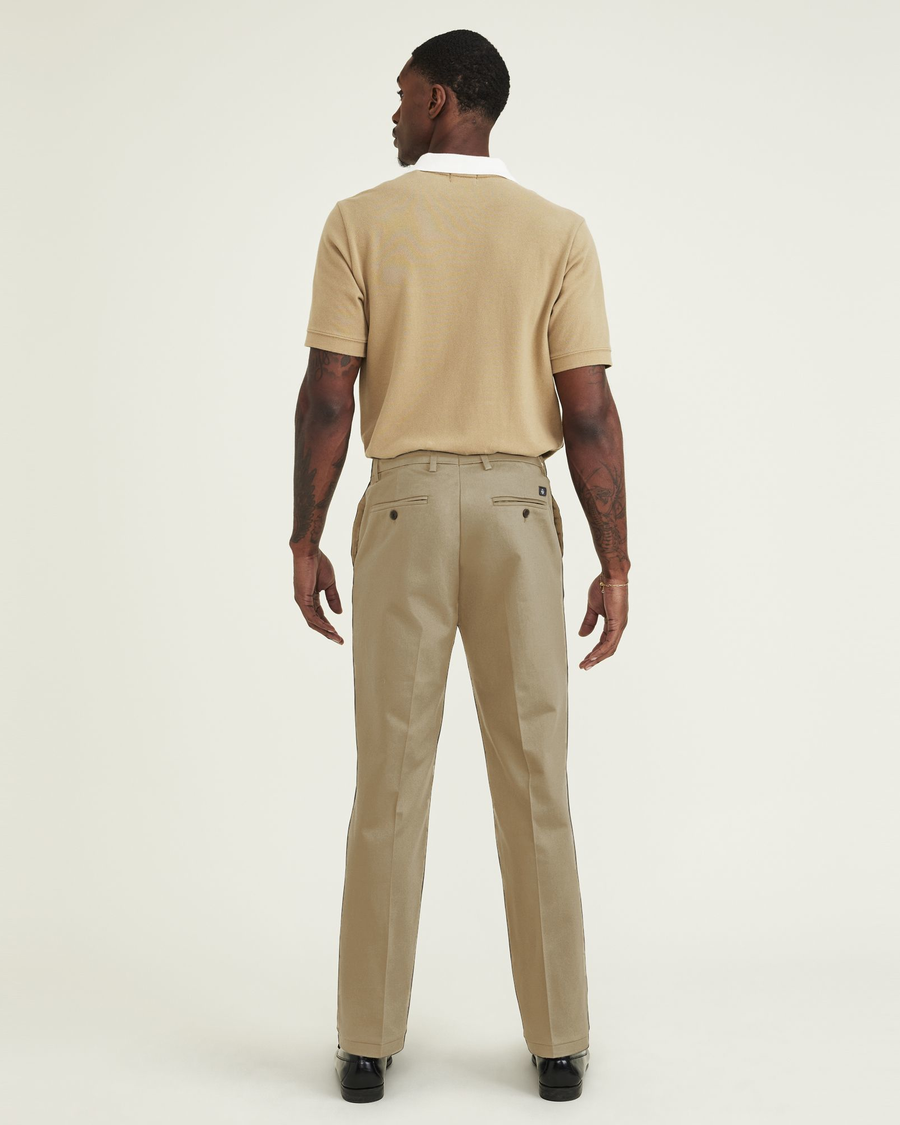Back view of model wearing New British Khaki Signature Iron Free Khakis, Straight Fit with Stain Defender® (Big and Tall).