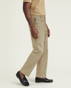 Side view of model wearing New British Khaki Signature Iron Free Khakis, Straight Fit with Stain Defender® (Big and Tall).
