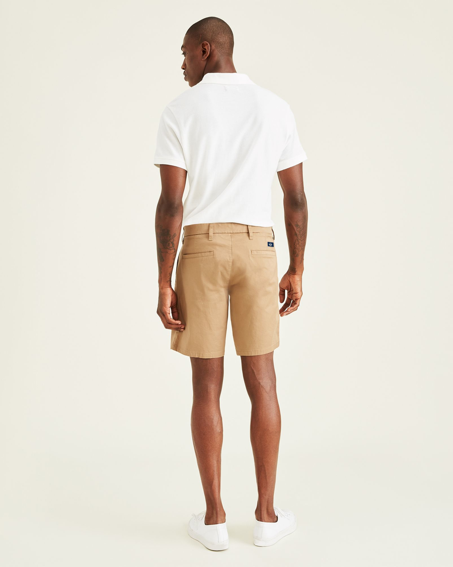 Back view of model wearing New British Khaki Ultimate 9.5" Shorts, Straight Fit.